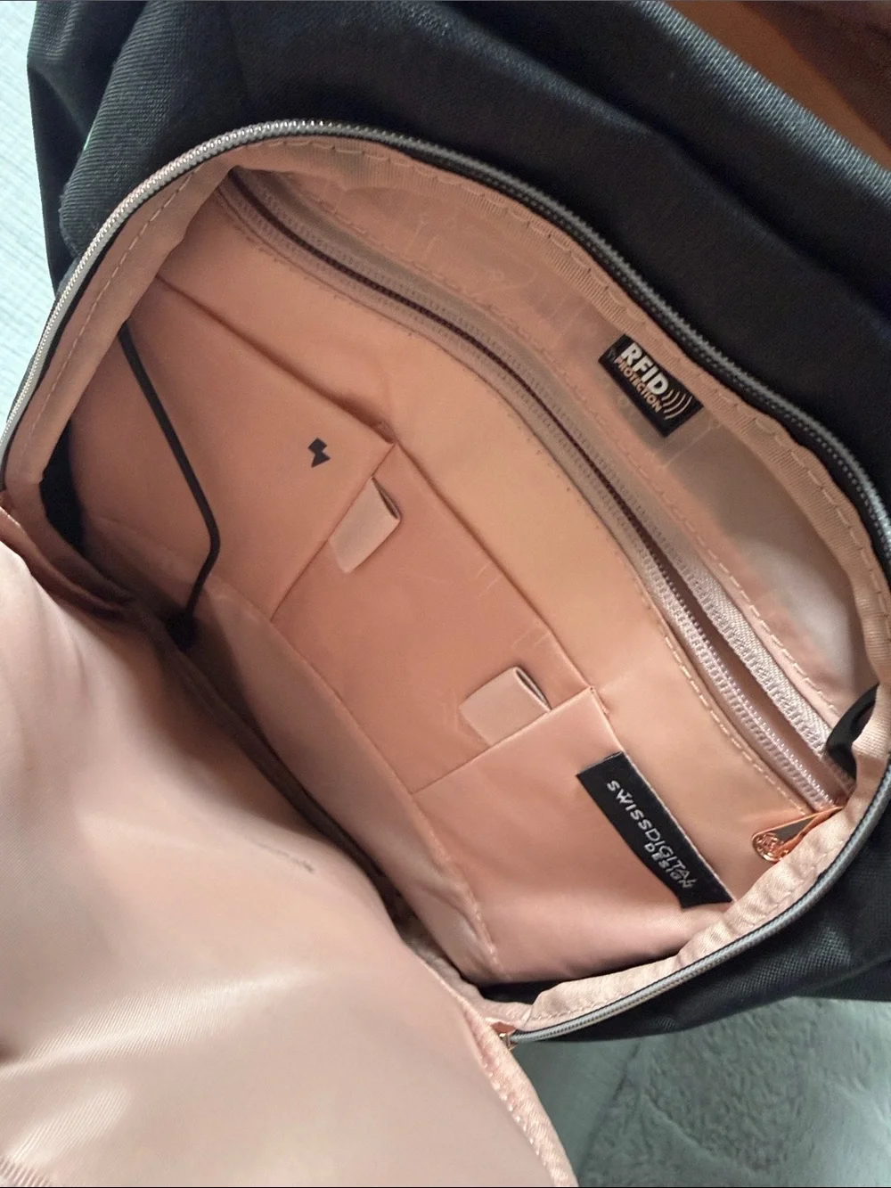 Used Black women Backpack with Rose Gold Accents